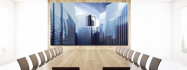 a large painting of a city skyline hangs over a conference table